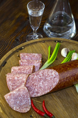 sausage on a wooden plate in a restaurant