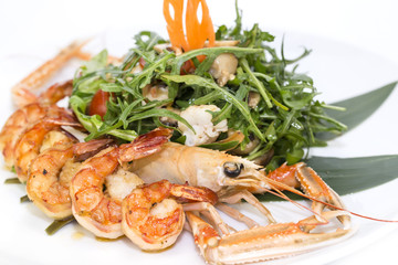 shrimp salad greens vegetables and crayfish in the restaurant