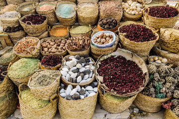 Counter with different spices and seasonings in the market