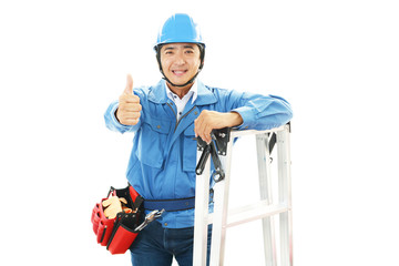 ガッツポーズの作業員