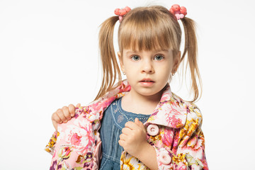 Cute blonde girl in blue dress