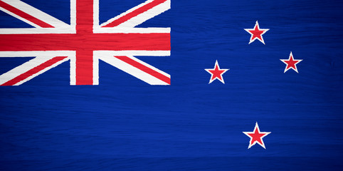 New Zealand flag on wood texture