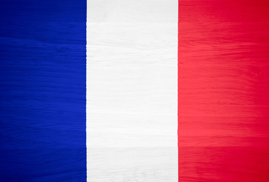 France flag on wood texture