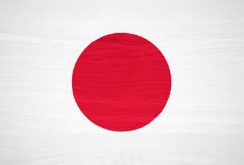 Japan flag on wood texture