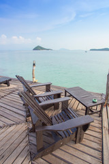 Fototapeta na wymiar chairs wood with the island view
