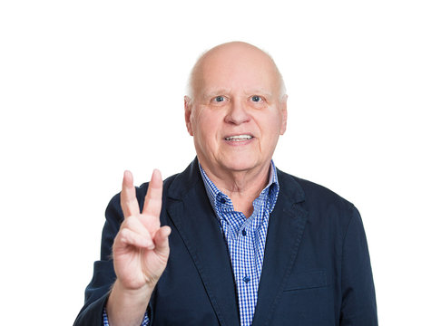 Senior man showing victory or number two fingers sign, gesture