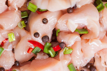 Fresh chicken meat on wooden board