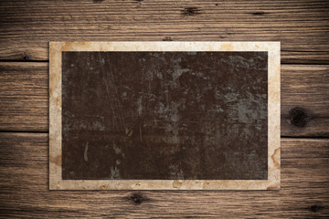 Old paper on the wood background