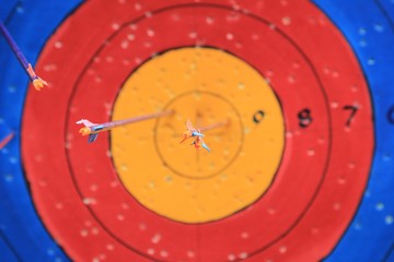 Three Arrow hit goal ring in archery target