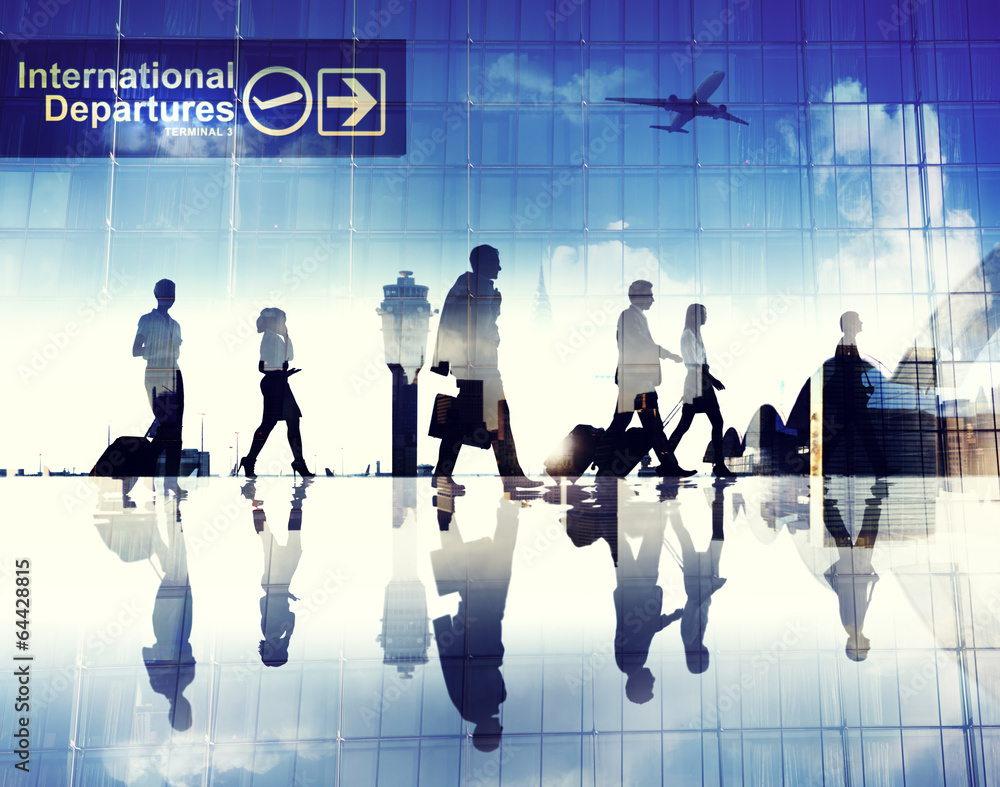 Wall mural silhouettes of business people walking in an airport - Wall murals