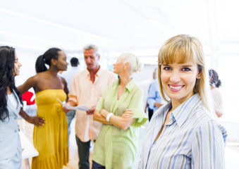 Business Woman with her Colleagues at the Back