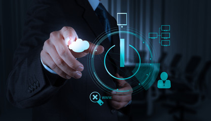 Businessman working with a Cloud Computing diagram on the new co