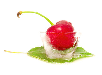 delicious cherry inside ice cube