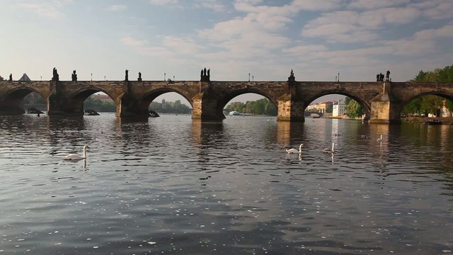 View from Kampa of Charles Bridge in Prague at sunrise