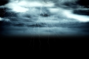 Stormy dark sky with lightning bolts