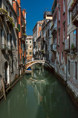 Obraz na płótnie Canvas Typical Canal, Bridge and Historical Buildings in Venice, Italy