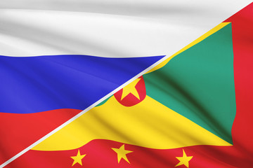 Series of ruffled flags. Russia and Grenada.