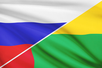 Series of ruffled flags. Russia and Republic of Guinea-Bissau.