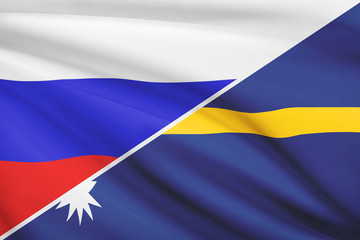 Series of ruffled flags. Russia and Republic of Nauru.