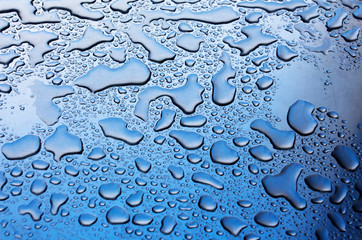 Rain drops on metal surface