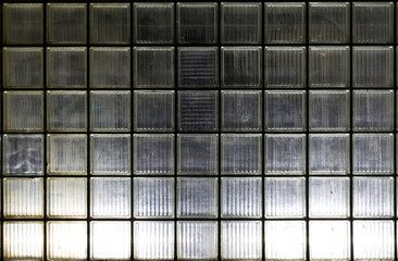 wall of glass blocks in night illumination
