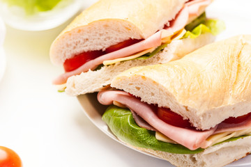 Panini sandwich with ham, cheese and tomato