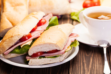 Panini sandwich with ham, cheese and tomato