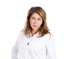 Pissed off middle aged woman looking at you on white background 