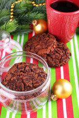 Delicious Christmas cookies in jar on table close-up