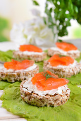 Delicious canapes on table close-up