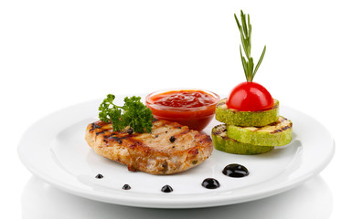 Grilled steak and grilled vegetables on plate, isolated on