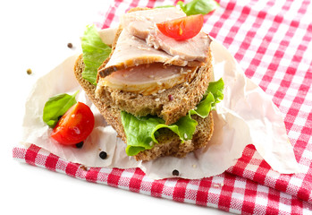 Delicious sandwiches with meet on table close-up
