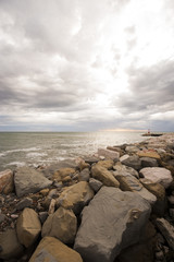 Clouds, rock and sea