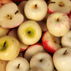 candles in shape of the apple fruit as background