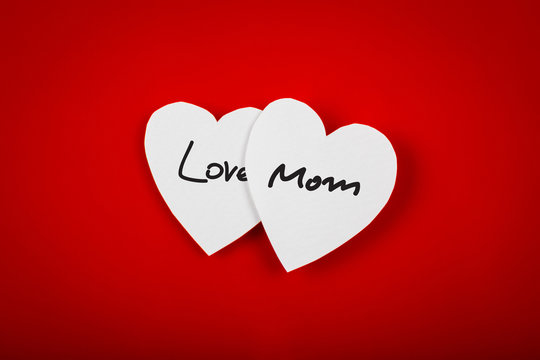 Paper heart shape symbol for mother's day