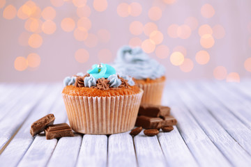 Tasty cupcake with butter cream,