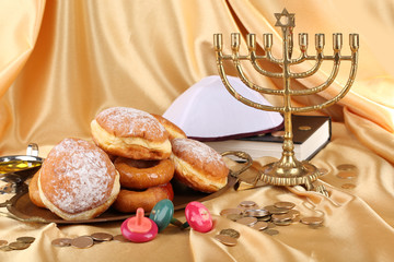 Festive composition for Hanukkah on cloth close-up