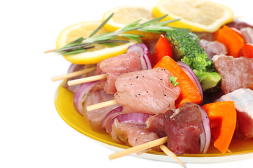 Raw pork kebab isolated on white