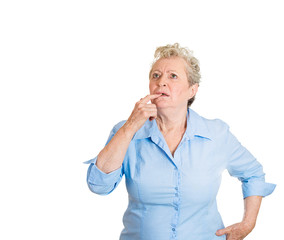 Deep thinker. Senior elderly woman trying to remember something 