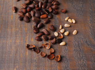 Cedar pine nuts on wooden table