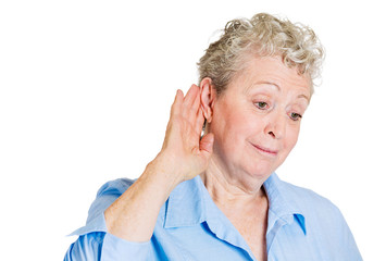 Headshot old woman eavesdropping on white background 
