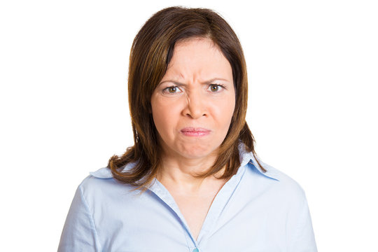 Headshot angry woman isolated on white background 