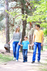 Fototapeta premium Happy family, walk in the park