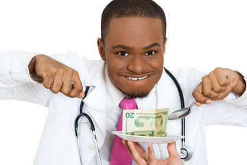 Doctor eating money making money in health care concept 