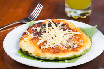 traditional bibingka with cheese on top