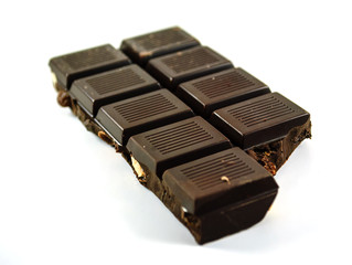 A partially broken dark chocolate bar