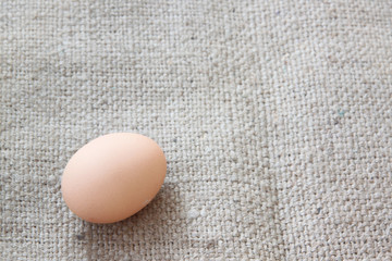 eggs on sackcloth of background.