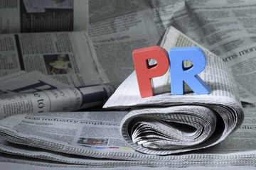 Word PR on newspaper - obrazy, fototapety, plakaty