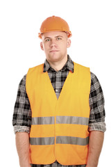 Smiling male construction worker in safety vest and hard hat