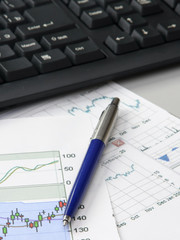 Office still-life, calculator and document.